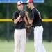 Milan High School pitcher sophomore Thomas Lindeman huddles on the mound with first baseman, senior Evan Peacock during the fifth inning of the MHSAA baseball quarterfinals against Coldwater High School at Nichols Field at Bailey Park in Battle Creek on Tuesday, June 11, 2013. Melanie Maxwell | AnnArbor.com